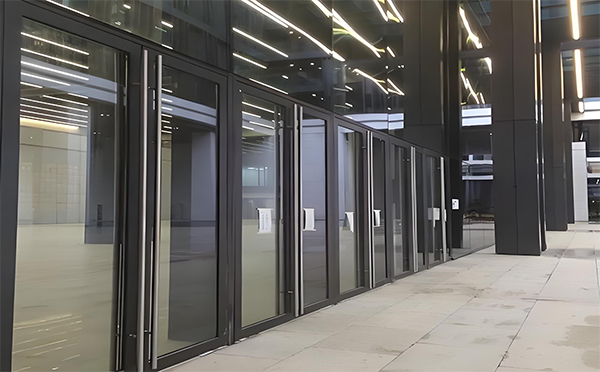 托里玻璃地弹门