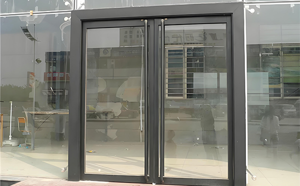 托里玻璃地弹门